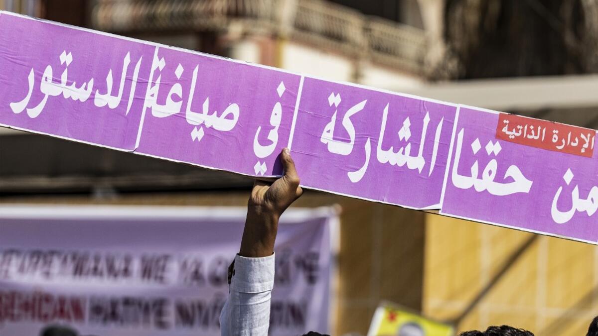 Syrian Kurds demonstrate in front of the United Nations offices in the Kurdish-majority city of Qamishli in northeast Syria on October 2, 2019 over their exclusion from the UN-backed constitutional committee.Delil SOULEIMAN / AFP