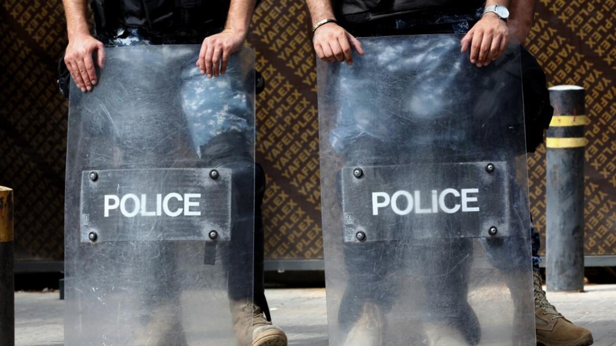 Lebanese riot policemen stand guard during a demonstration in central Beirut's Martyr Square on October 6, 2019. Lebanese protested in the capital over increasingly difficult living conditions, amid fears of a dollar shortage and possible price hikes. ANWAR AMRO / AFP