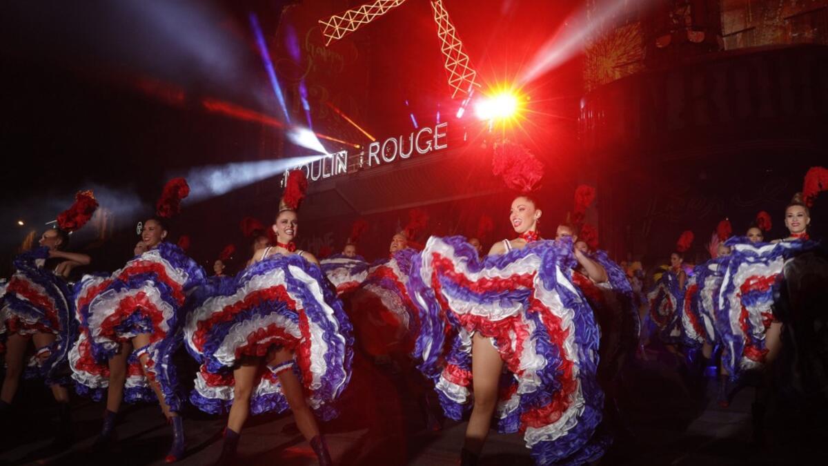 Moulin Rouge dancers perform during the celebration of the 130th anniversary of the French oldest cabaret, on October 6, 2019 in Paris.  GEOFFROY VAN DER HASSELT / AFP