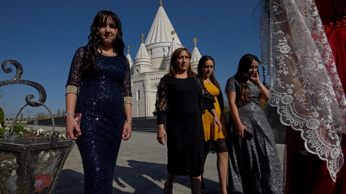 The new Yazidi Temple in the village of Aknalich, 35 kilometres from the Armenian capital Yerevan, on October 11, 2019 Worshippers kiss the marble walls and gaze at an ornate peacock inlaid with multi-coloured stones inside the world's largest Yazidi temple, which has opened in Armenia.  KAREN MINASYAN / AFP