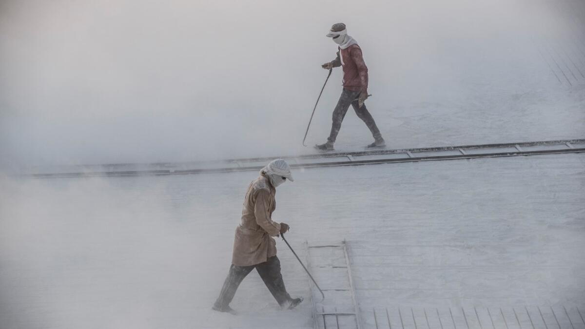 They handle dangerous machinery with finesse, and shrug off the dangers of a job where a mistake can prove fatal. Khaled DESOUKI / AFP
