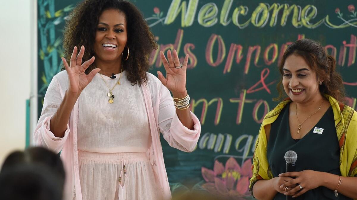 Former US First Lady Michelle Obama speaks to Vietnamese students in Can Giuoc district, Long An province on December 9, 2019. Michelle Obama and Julia Roberts visit to promote girls' education in Vietnam. Nhac NGUYEN / AFP