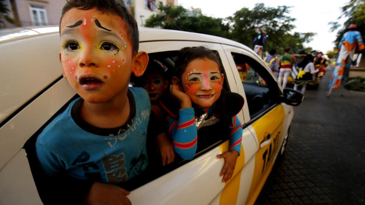 Clowns pose for a picture during the International Clown Day in Guadalajara, Mexico, on December 10, 2019. Ulises Ruiz / AFP