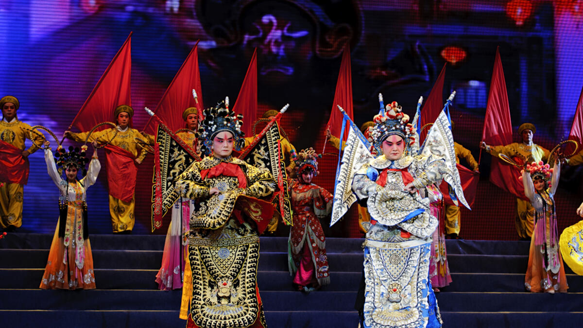 Chinese opera actor perform on stage at Jincheng theater (Shutterstock)