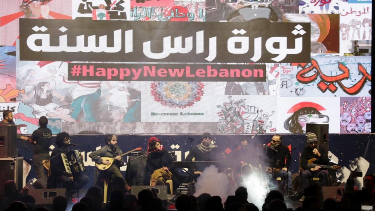 Lebanese band "The Great Departed" performs during new year's celebrations in downtown Beirut on December 31, 2019. ANWAR AMRO / AFP