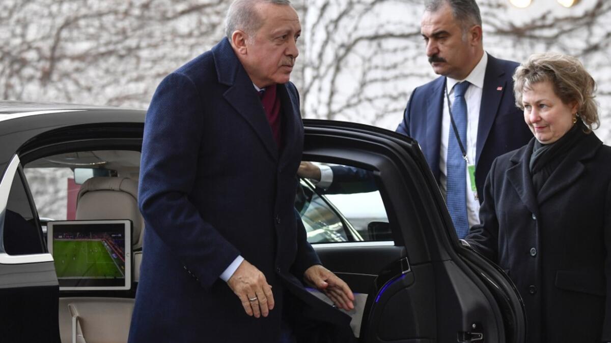 Turkish President Recep Tayyip Erdogan arrives to attend the Peace summit on Libya at the Chancellery in Berlin on January 19, 2020. World leaders gather in Berlin on January 19, 2020 to make a fresh push for peace in Libya. John MACDOUGALL / AFP