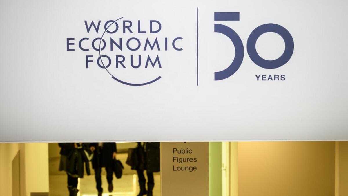 A sign is seen inside the Congress center ahead of the annual meeting of the World Economic Forum (WEF) on January 20, 2020 in Davos. Fabrice COFFRINI / AFP