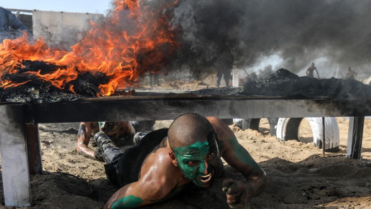 Palestinian police cadets take part in a training session at a police academy in Khan Yunis, in the southern Gaza Strip on February 6, 2020. MAHMUD HAMS / AFP
