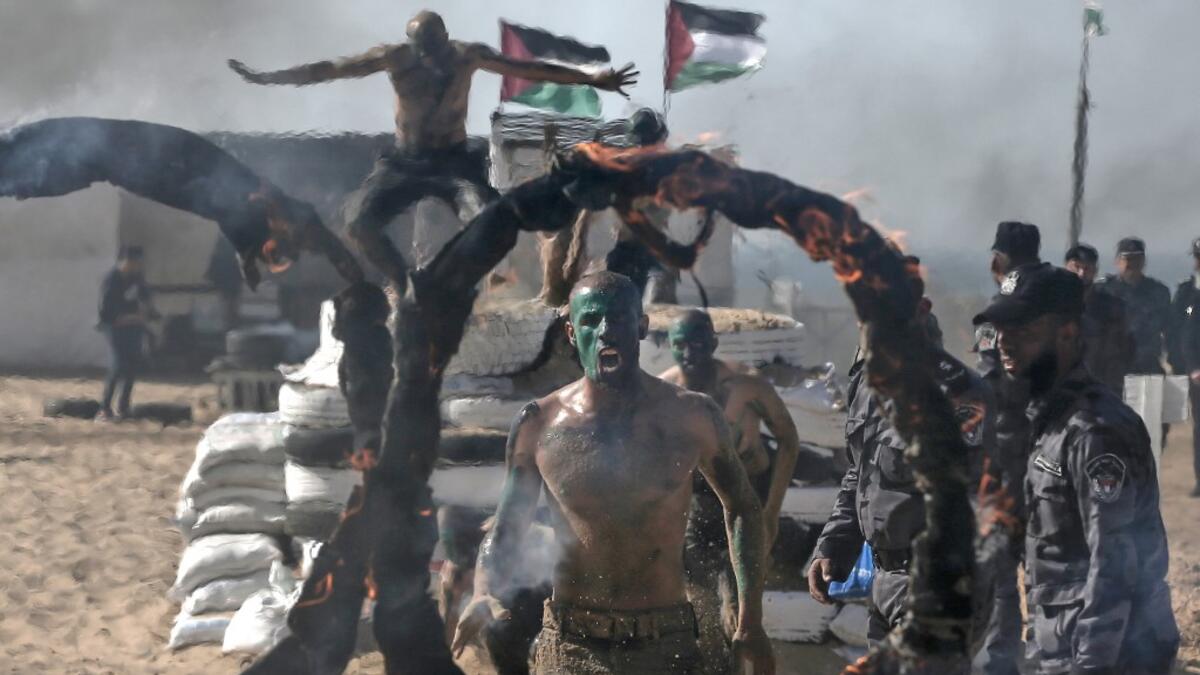 Palestinian police cadets take part in a training session at a police academy in Khan Yunis, in the southern Gaza Strip on February 6, 2020. MAHMUD HAMS / AFP