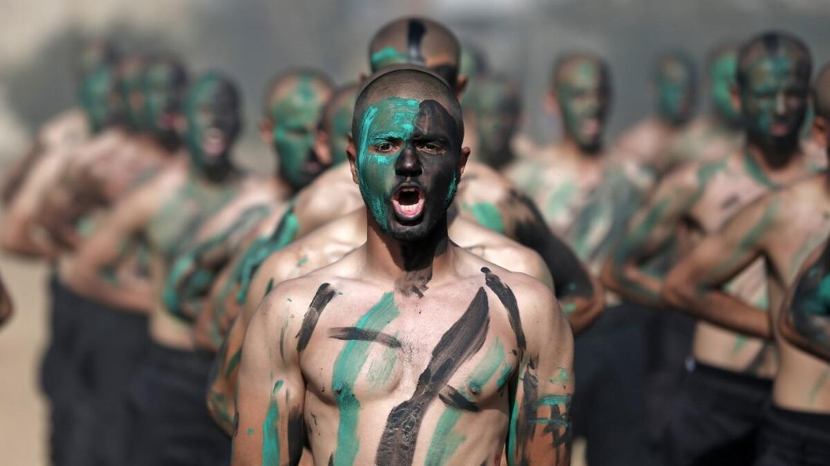 Palestinian police cadets take part in a training session at a police academy in Khan Yunis, in the southern Gaza Strip on February 6, 2020. MAHMUD HAMS / AFP