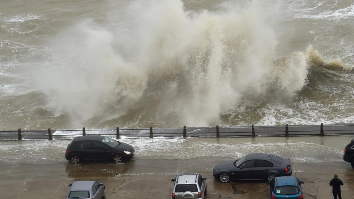 Britain and Ireland hunkered down Sunday for a powerful storm expected to disrupt air, rail and sea links, cancel sports events, cut electrical power and damage property. With howling winds and driving rain, forecasters said Ciara would also hit France, Belgium, the Netherlands, Switzerland and Germany. GLYN KIRK / AFP