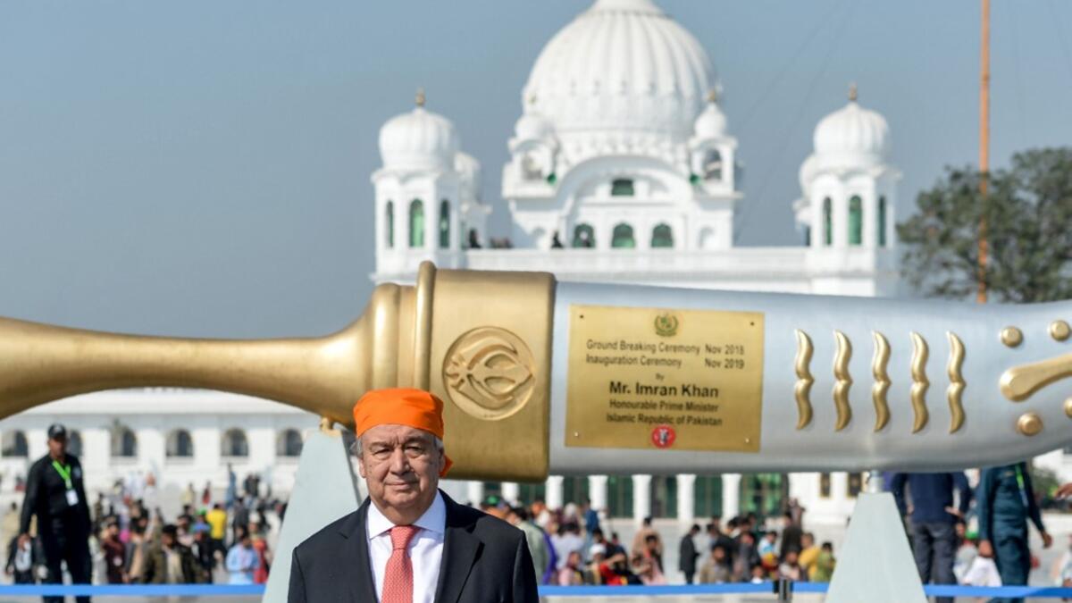 United Nations Secretary-General Antonio Guterres poses for a photograph during his visit of the Sikh Shrine of Baba Guru Nanak Dev at the Gurdwara Darbar Sahib in Kartarpur near the Pakistan-India border, on February 18, 2020. Aamir QURESHI / AFP