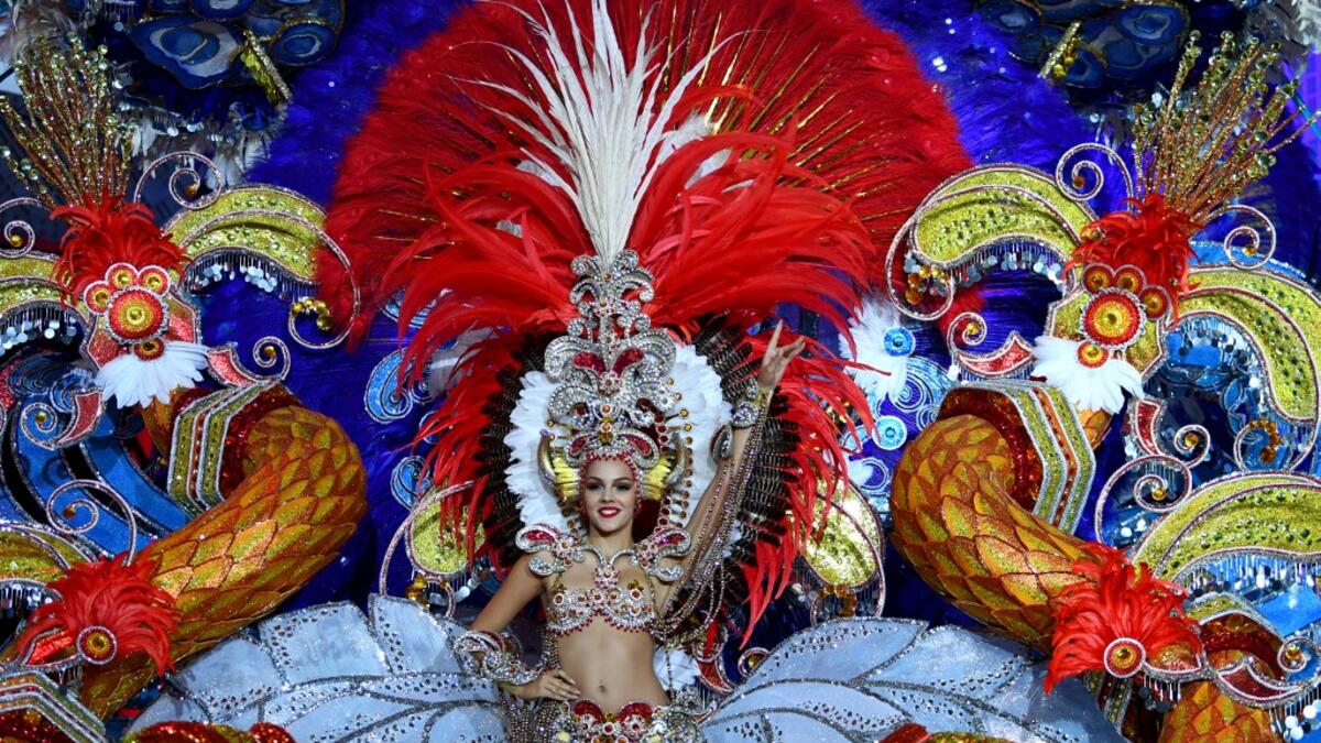 A participant presents her outfit during the Queen of the Carnival pageant contest in Santa Cruz de Tenerife, on the Spanish Canary island of Tenerife, on February 19, 2020. Gabriel BOUYS / AFP