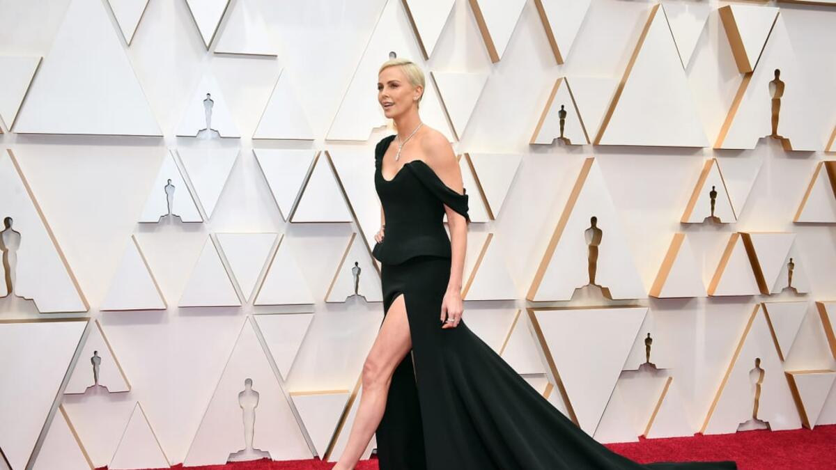 Charlize Theron wears chic custom made Dior gown