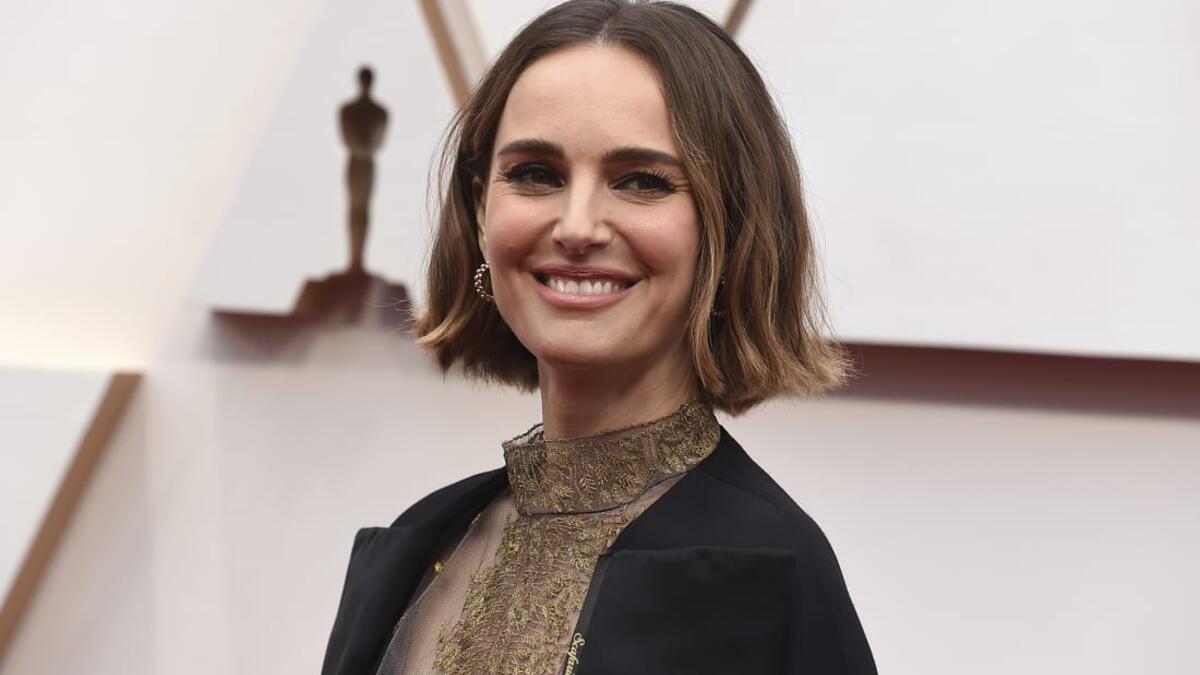 Natalie Portman's cape embroidered with names of women in the industry, "who were not represented for their incredible work this year."