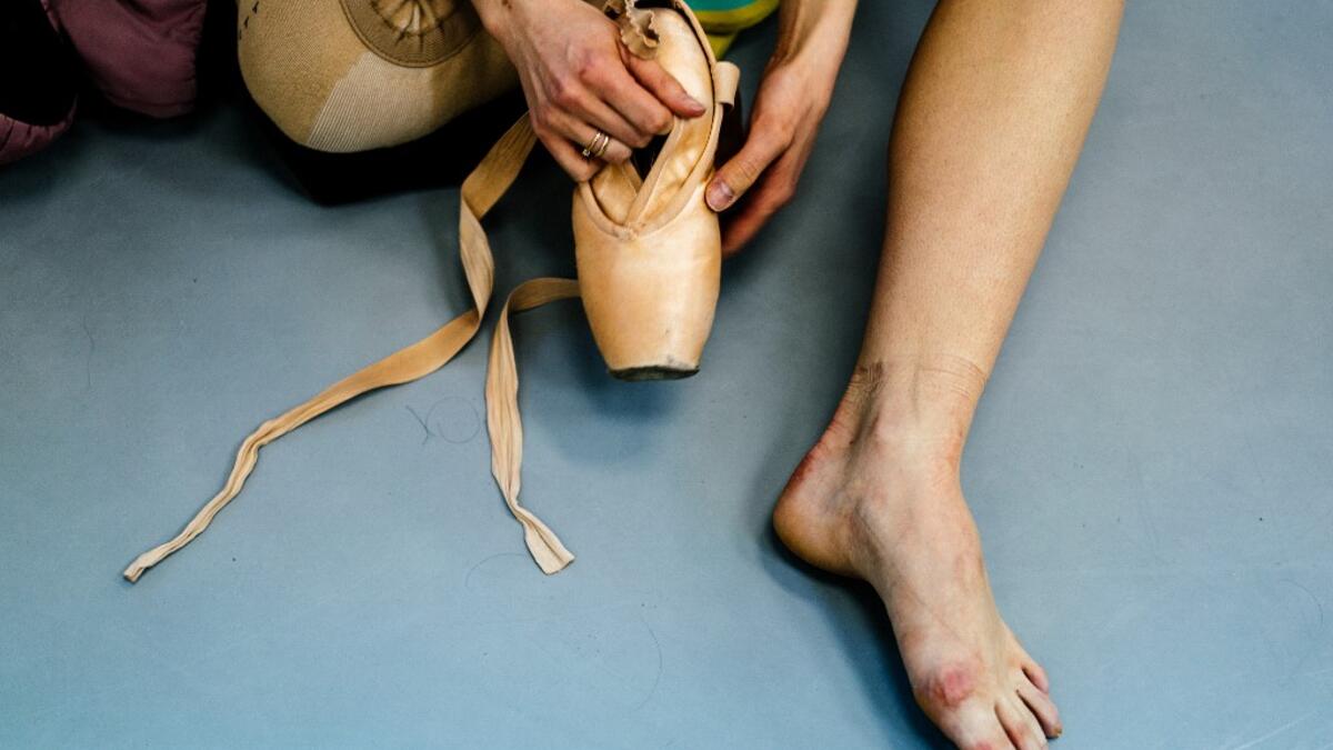 Dancer Alexandra Kirshina rehearses on pointes made at Grishko company especially for her in Moscow on February 25, 2020. Born in the chaos of the collapse of the Soviet Union, the Grishko family business has emerged among the top makers in the world of dance shoes, notably classic ballet pointe shoes, worn on the world's great stages. Dimitar DILKOFF / AFP