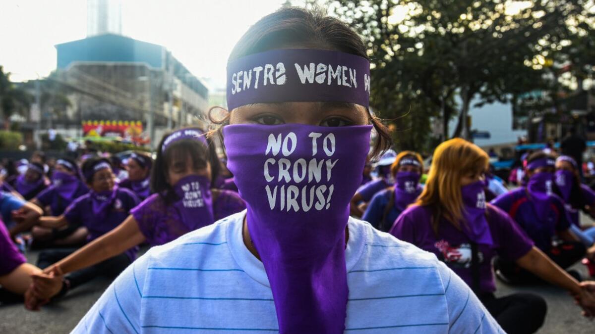 Filipino women hold a protest rally during the celebration of International Women's Day in Manila on March 8 2020. Maria TAN / AFP