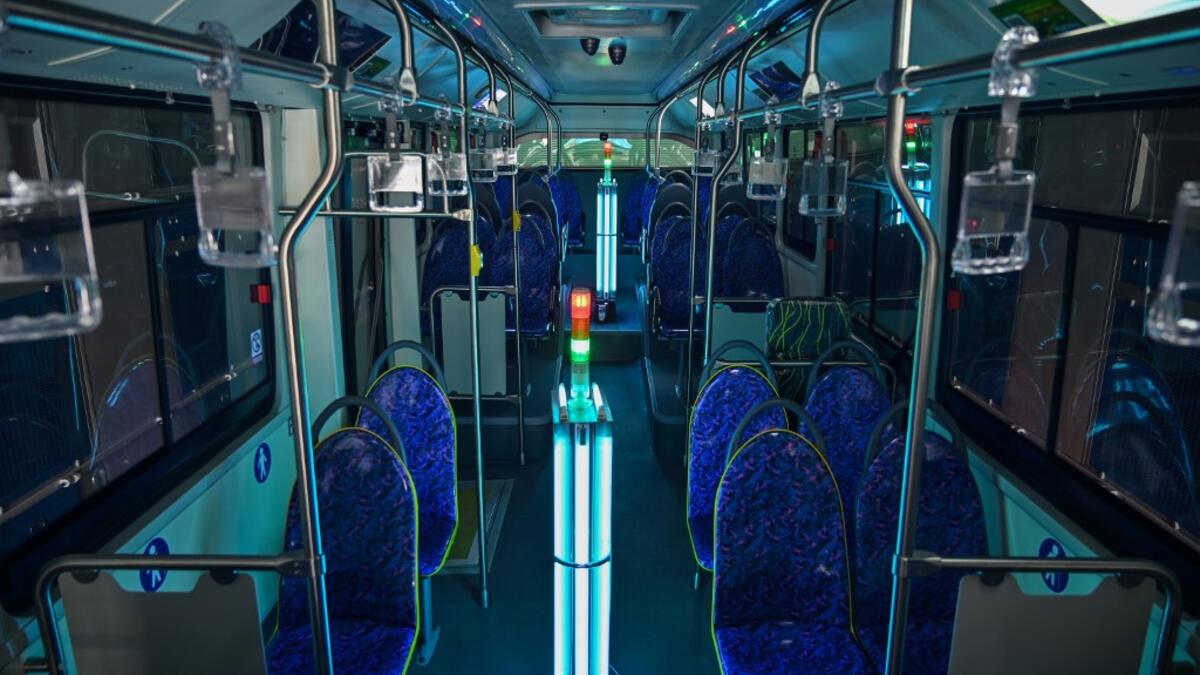 A bus has been disinfected with ultraviolet rays as part of measures against of the COVID-19 coronavirus in Shanghai on March 12, 2020 Hector RETAMAL / AFP
