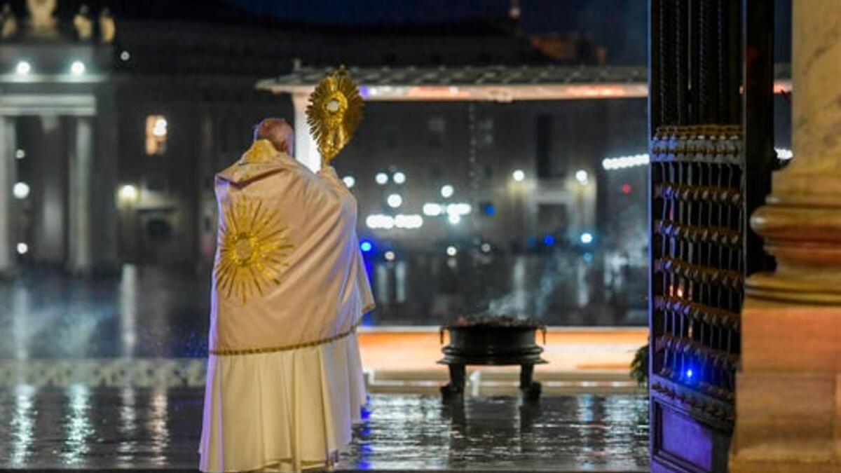 Pope Francis gives the Urbi et orbi blessing after presiding over a moment of prayer in St Peter's Square. March 27, 2020 (Photo: Vatican Media/AFP via Getty Images)