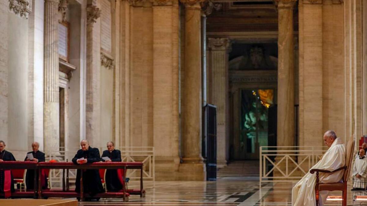 The Pope in a final moment of prayer after delivering the blessing from Rome to the Rest of the World. (AFP/File)