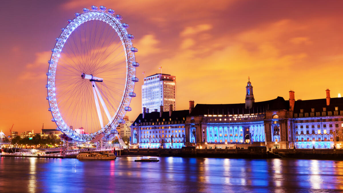 London, England the UK skyline in the evening. Ilumination of the London Eye and the buildings next to River Thames.(Shutterstock/ File Photo)