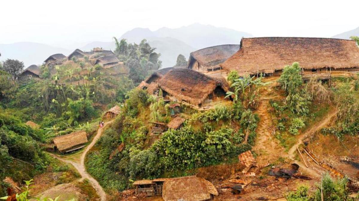 This photo taken on February 9, 2020 shows a general view of Karmawlawyi village in Myanmar's Sagaing region, near the border with India. The king of the Konyak tribe sleeps in Myanmar, but eats in India -- his house, village and people divided by a mountain border which serves as a vulnerable lifeline now severed by a coronavirus lockdown.  Ye Aung THU / AFP