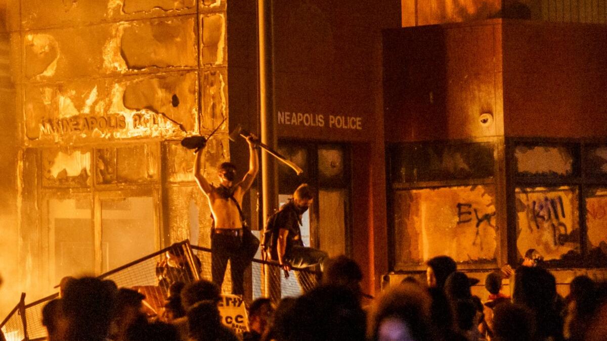 A police precinct in Minnesota went up in flames late on May 28 in a third day of demonstrations as the so-called Twin Cities of Minneapolis and St. Paul seethed over the shocking police killing of a handcuffed black man. The precinct, which police had abandoned, burned after a group of protesters pushed through barriers around the building, breaking windows and chanting slogans. A much larger crowd demonstrated as the building went up in flames. kerem yucel / AFP