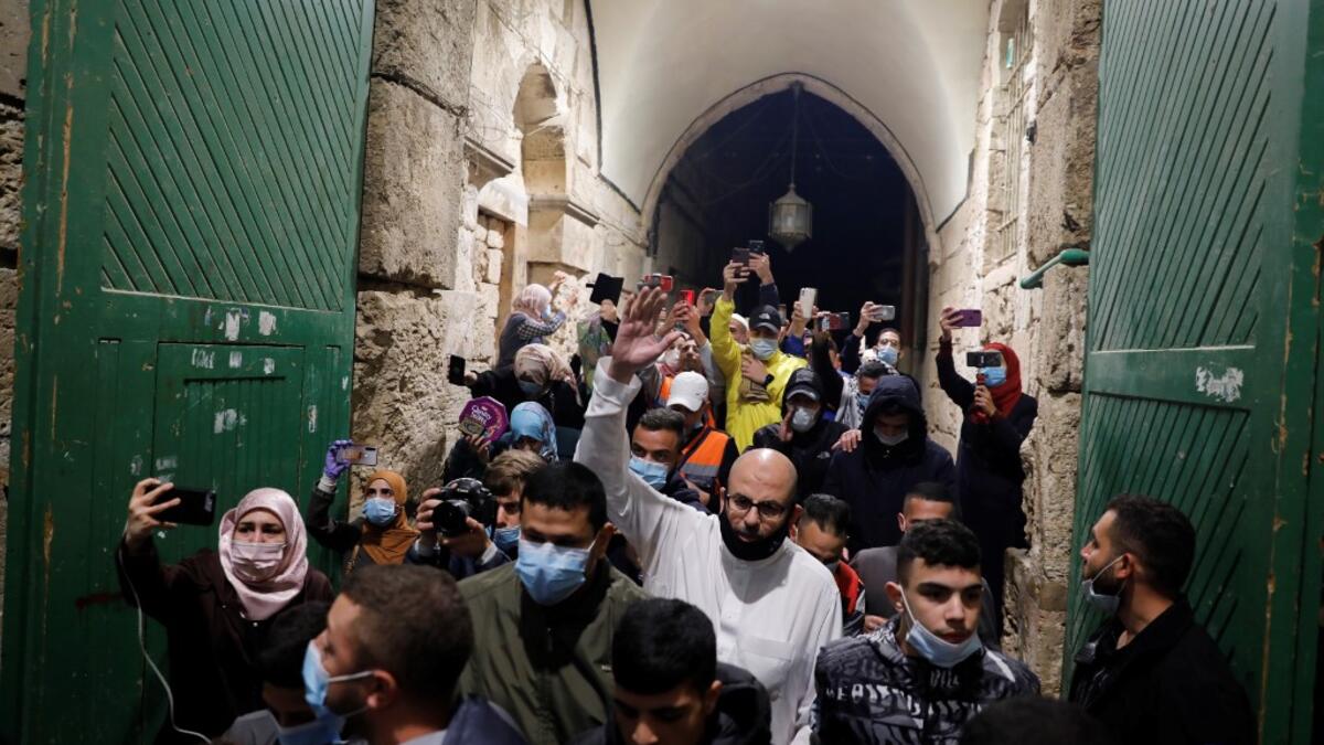 Palestinian Muslim worshippers enter to pray at the al-Aqsa mosque compound, Islam's third holiest site, in Jerusalem's Old City on May 31, 2020, after a two-month closure due to the COVID-19 pandemic. Ahmad GHARABLI / AFP