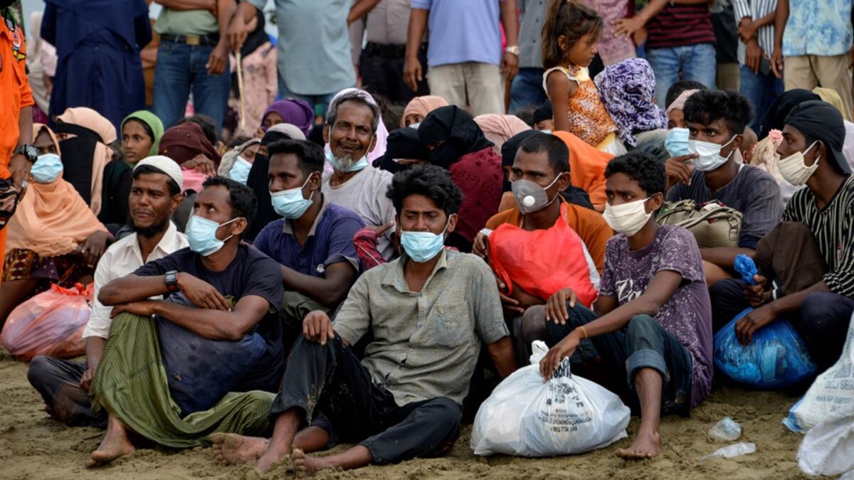 The rescued Rohingya were given temporary shelter in people's homes after they were brought ashore [Chaideer Amhyuddin/AFP]