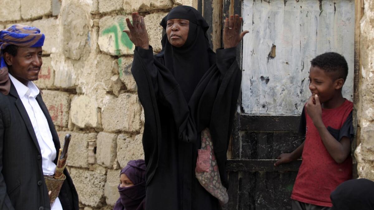 Members of Yemen's minority group known as "Muhamasheen" -- literally the "Marginalised" are pictured at a slum in the capital Sanaa on July 4, 2020. At a time when the Black Lives Matter movement is reshaping societies, black Yemenis have scant hope for an end to centuries of discrimination that has only worsened during the civil war. In Sanaa, members of the minority group known as "Muhamasheen" live in dismal conditions in densely populated slums. They count among the poorest of the poor in the Arab worl