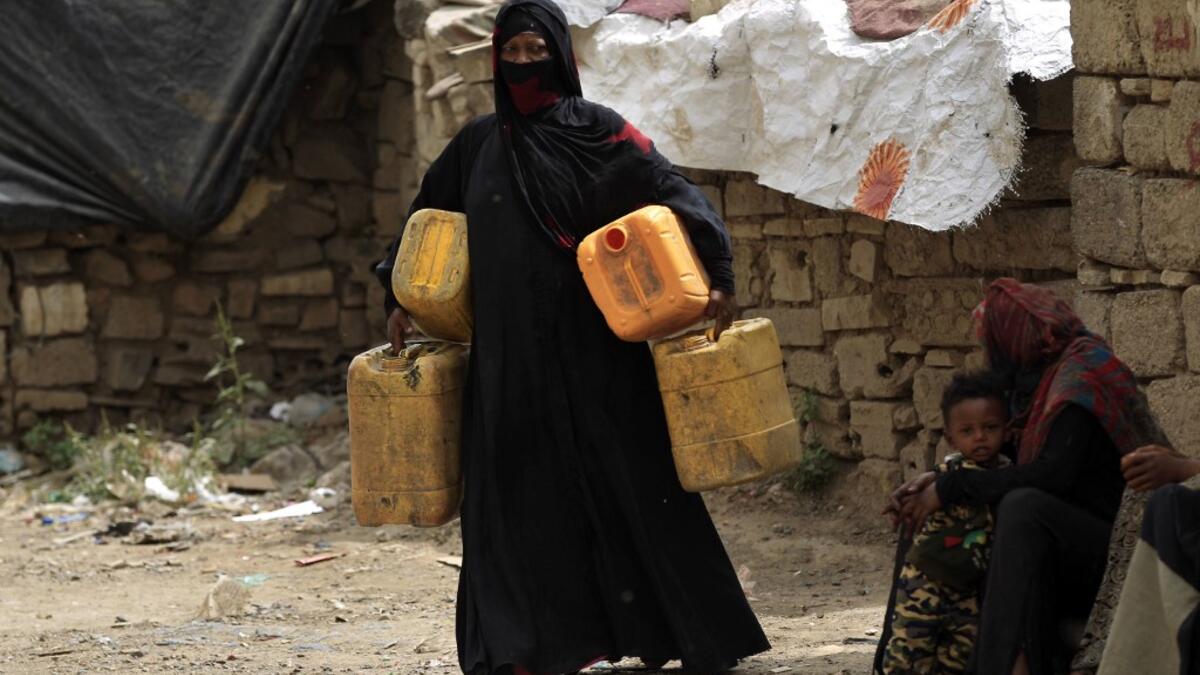 Members of Yemen's minority group known as "Muhamasheen" -- literally the "Marginalised" are pictured at a slum in the capital Sanaa on July 4, 2020. At a time when the Black Lives Matter movement is reshaping societies, black Yemenis have scant hope for an end to centuries of discrimination that has only worsened during the civil war. In Sanaa, members of the minority group known as "Muhamasheen" live in dismal conditions in densely populated slums. They count among the poorest of the poor in the Arab worl
