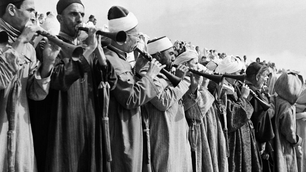 Musicians play during a ceremony on the Grand Socco place, in October 1945 in Tangiers, Morocco. AFP