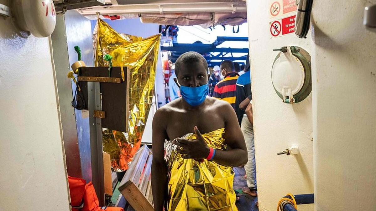 'Solar blankets' are often used in emergency situations because they keep the body warm during cold weather and deflect heat during hot weather (AFP)