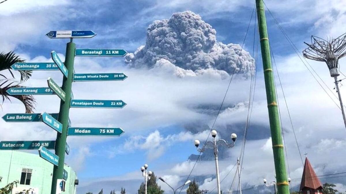 Rumbling Mount Sinabung on Indonesia’s Sumatra island sends a column of volcanic materials as high as 16,400 feet into the sky (Twitter)