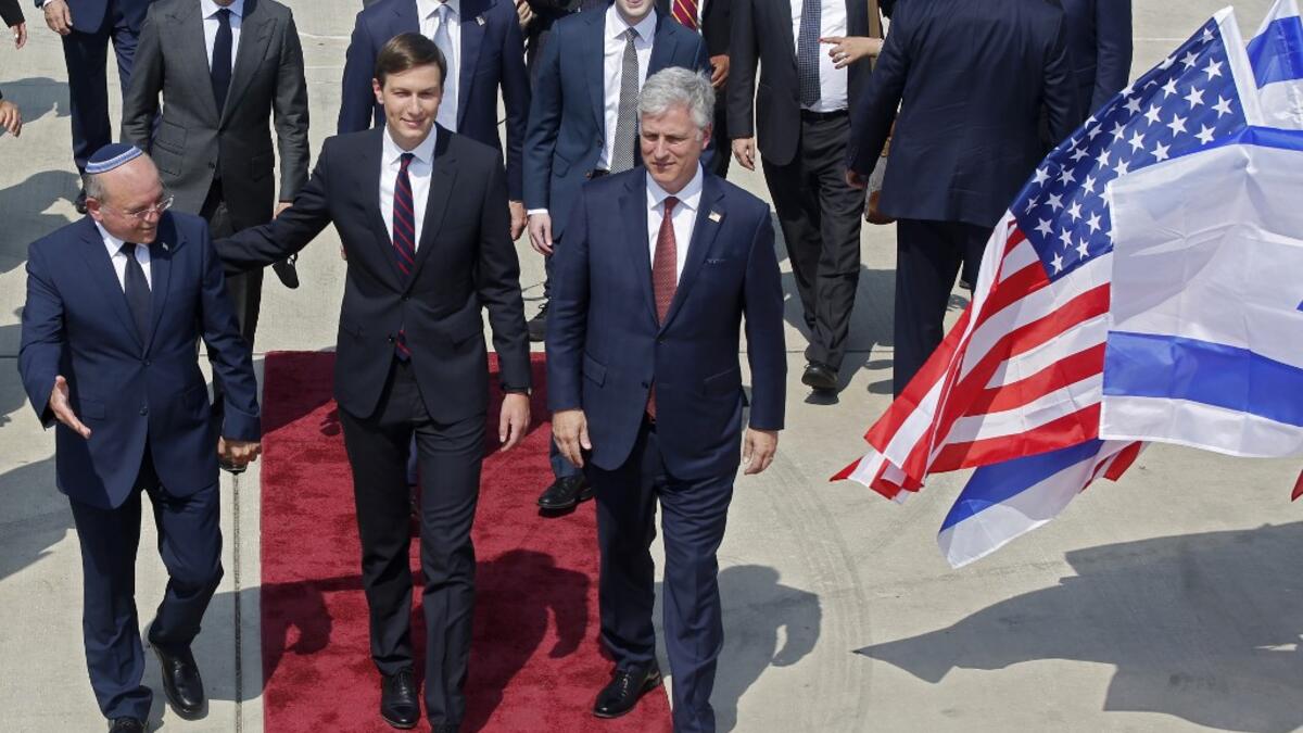 US Presidential Adviser Jared Kushner (C), US National Security Adviser Robert O’Brien (R) and Head of Israel's National Security Council Meir Ben-Shabbat (L) board the El Al's flight LY971, which will carry an Israeli-American delegation from Tel Aviv to Abu Dhabi, at the Ben Gurion Airport near Tel Aviv on August 31, 2020. NIR ELIAS / POOL / AFP