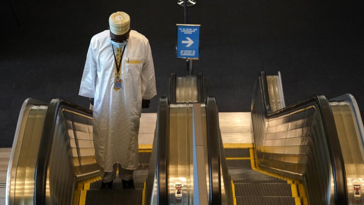 A delegate arrives at the United Nations September 22, 2020 for the 75th General Assembly of the United Nations which is mostly virtual due to the covid-19 pandemic in New York. UN Secretary-General Antonio Guterres urged the world to prevent a Cold War between the United States and China and halt conflicts so it can focus on the covid-19 pandemic. TIMOTHY A. CLARY / AFP