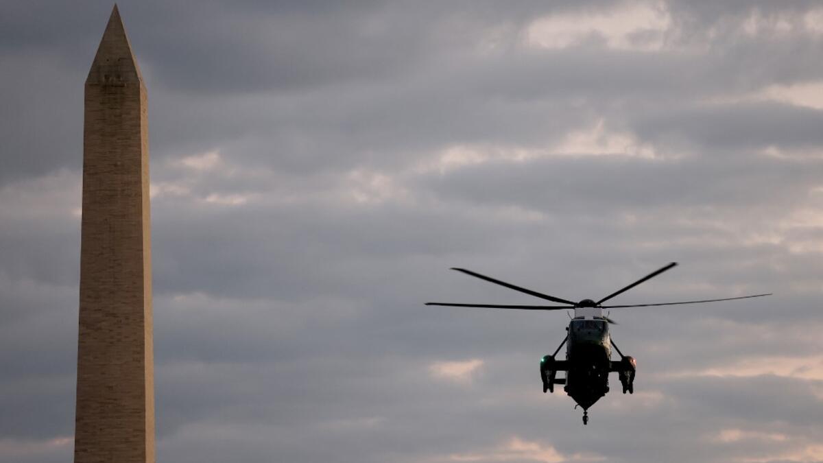 Marine One returns President Donald Trump to the White House from Walter Reed National Military Medical Center on October 05, 2020 in Washington, DC. Trump spent three days hospitalized for coronavirus. Win McNamee/Getty Images/AFP WIN MCNAMEE / GETTY IMAGES NORTH AMERICA / Getty Images via AFP