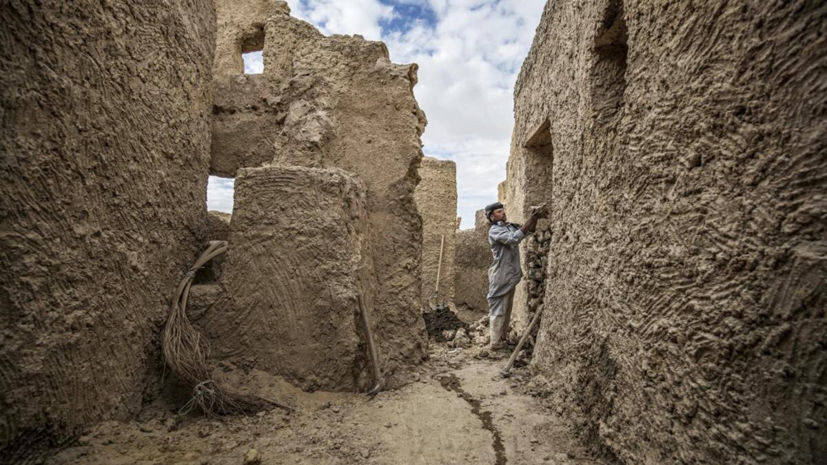 After it was worn away by erosion, and then torrential rains in 1926, the European Union and Egyptian company Environmental Quality International (EQI) from 2018 sought to restore the building, at a cost of over $600,000.  Khaled DESOUKI / AFP