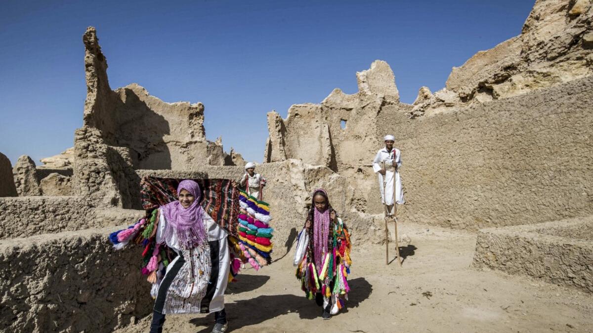After it was worn away by erosion, and then torrential rains in 1926, the European Union and Egyptian company Environmental Quality International (EQI) from 2018 sought to restore the building, at a cost of over $600,000.  Khaled DESOUKI / AFP