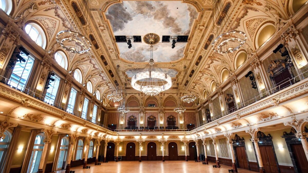A picture taken on November 19, 2020 shows the great hall for classic concerts at the Stadthalle in Wuppertal, western Germany. The Stadthalle Wuppertal was built at the end of the 19th century and is known worldwide as a concert venue because of its unique acoustics. No public events will take place at theaters until December, 2020 to limit the spread of the novel coronavirus. Ina FASSBENDER / AFP