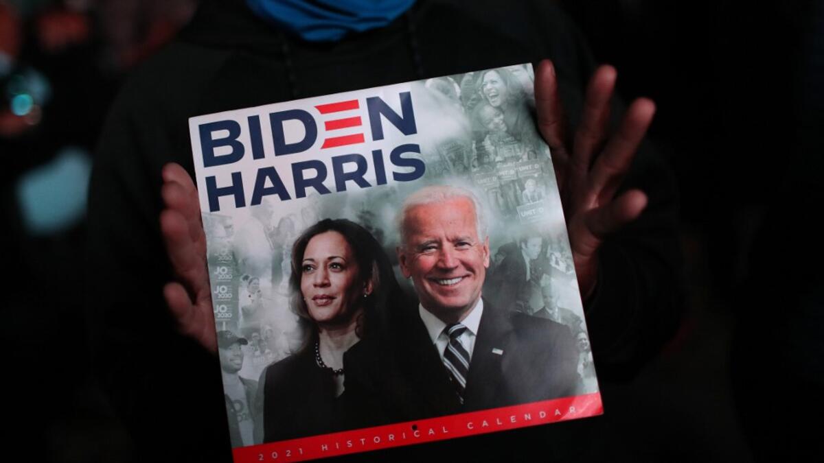 After four days of counting the high volume of mail-in ballots in key battleground states due to the coronavirus pandemic, the race was called for Biden after a contentious election battle against incumbent Republican President Donald Trump. Joe Raedle/Getty Images/AFP