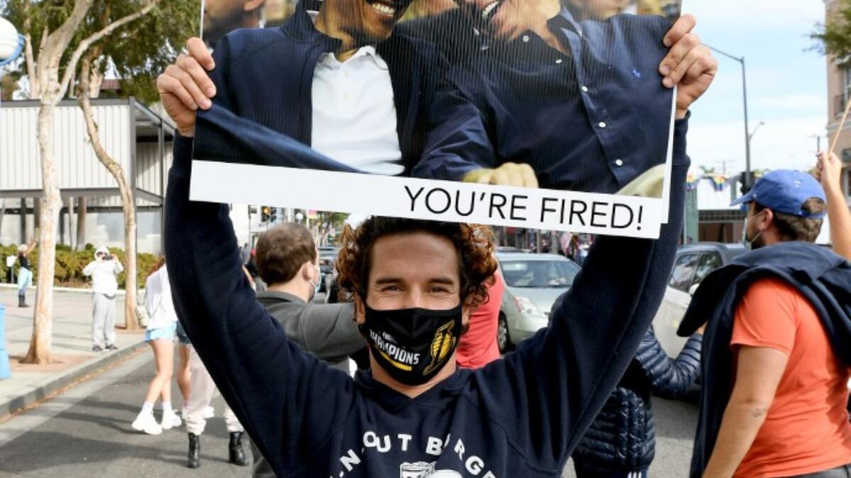 people have begun to congregate in cities across America after news outlets announced Joe Biden had reached the number of electoral votes needed to win the election. Kevin Winter/Getty Images/AFP
