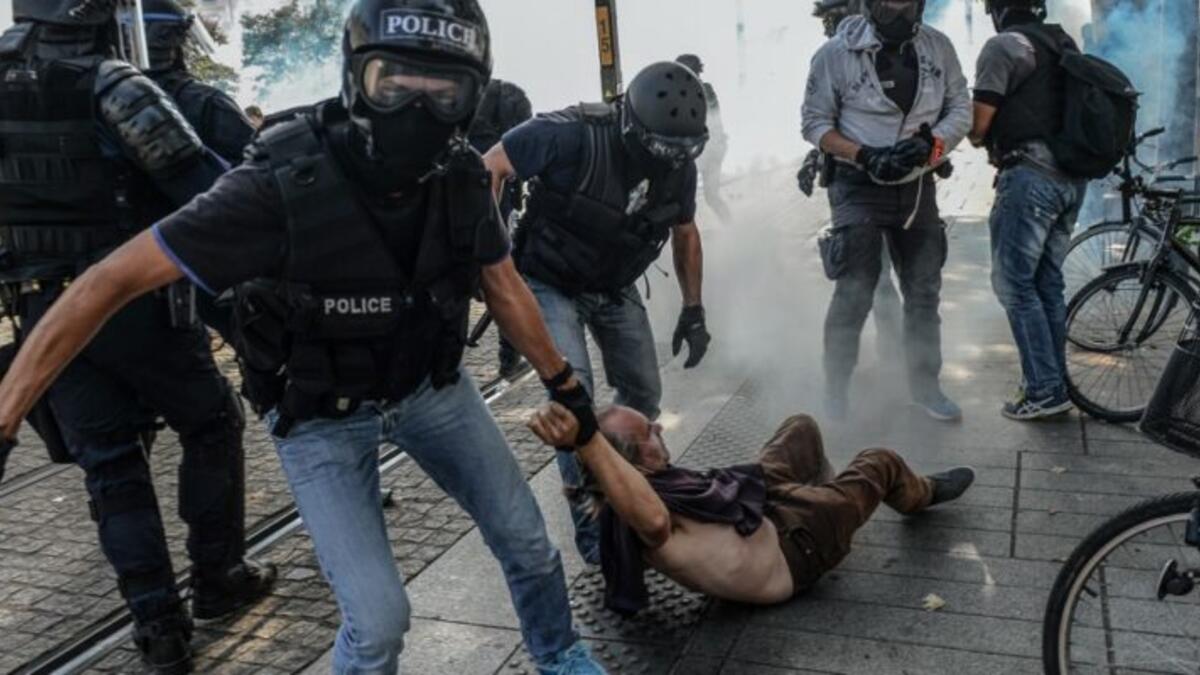 French lawmakers on Tuesday began debating a bill that could ban dissemination of images of police officers' faces, triggering protests in Paris and other French cities. (Picture credit: Jean-François Monier / AFP)
