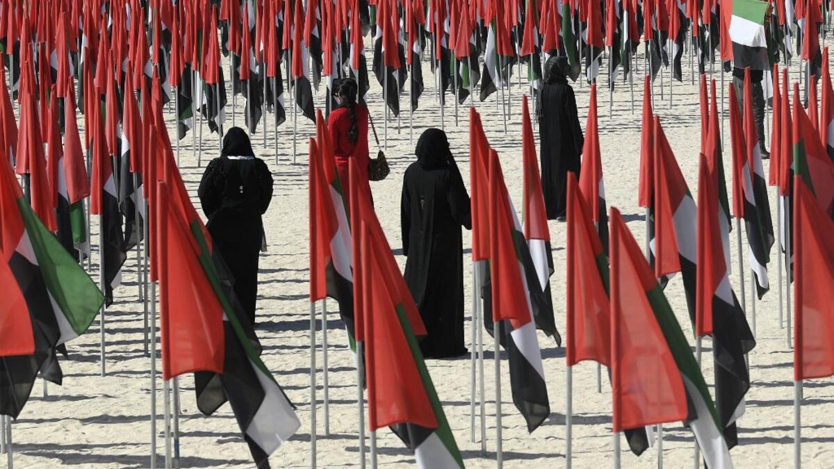 Emiratis attend celebrations of UAE's national day on December 2, 2020. Karim SAHIB / AFP