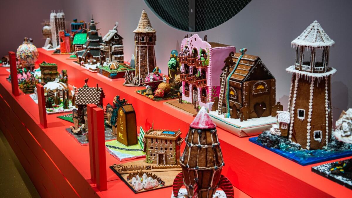 Gingerbread house models are pictured at the ArkDes, Sweden’s national centre for architecture and design, during this year's Gingerbread House 2020 competition with the theme 'Distance', on December 7, 2020 in Stockholm, Sweden. Jonathan NACKSTRAND / AFP