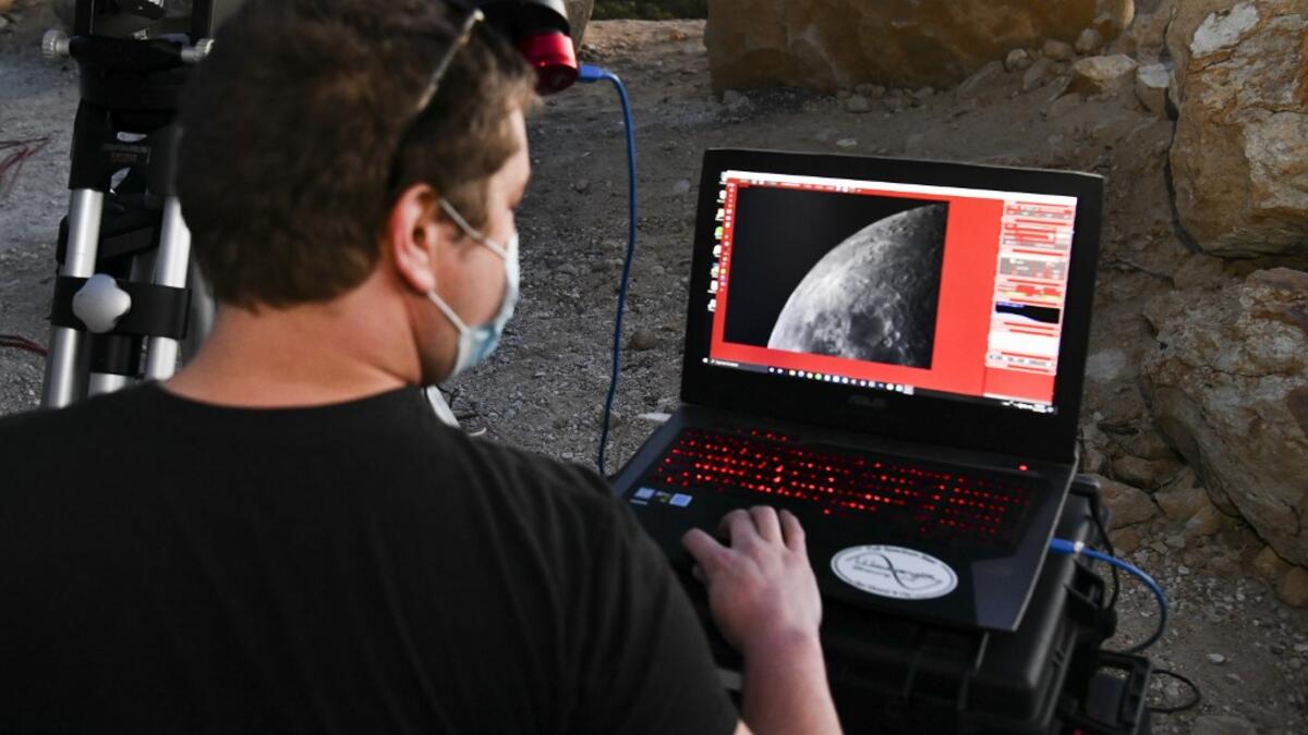 The planets, which remain about 450 million miles apart in space, have not appeared this close together from Earth's vantage point since 1623, and it's been nearly 800 years since the alignment occurred at night. The conjunction, which occurs on the night of the winter solstice by coincidence, has become known popularly as the "Christmas Star." The gas giants will not appear this close together again until 2080. Rodin Eckenroth/Getty Images/AFP Rodin Eckenroth / GETTY IMAGES NORTH AMERICA / Getty Images via