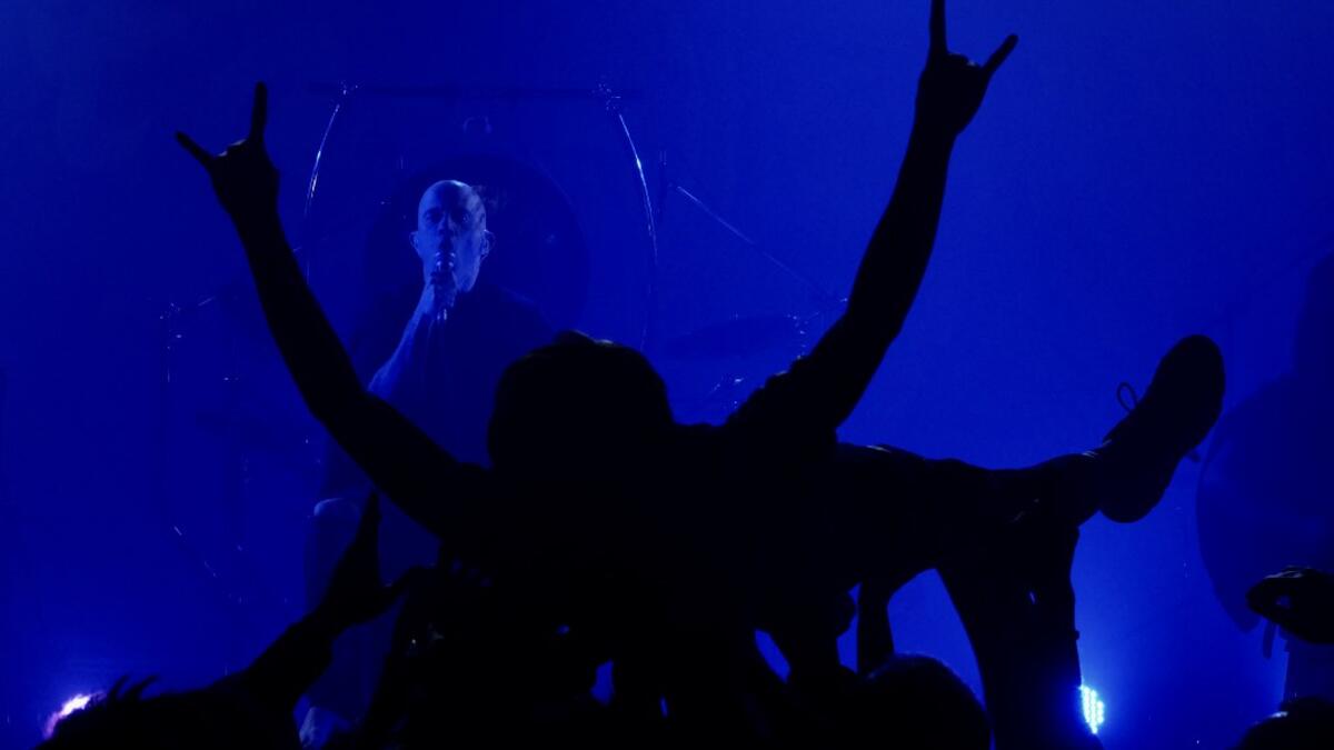 This picture taken on January 2, 2021 shows Joe Henley, a leading vocalist of Taiwanese death metal band 'Dharma' performing during a concert in Taichung. Sam Yeh / AFP