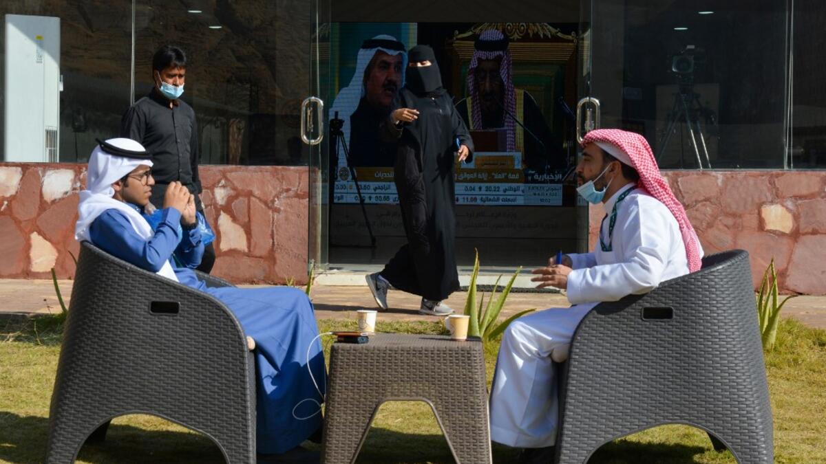 Journalists are pictured at the media centre ahead of the 41st Gulf Cooperation Council (GCC) summit in the city of Al-Ula in northwestern Saudi Arabia on January 5, 2021.FAYEZ NURELDINE / AFP