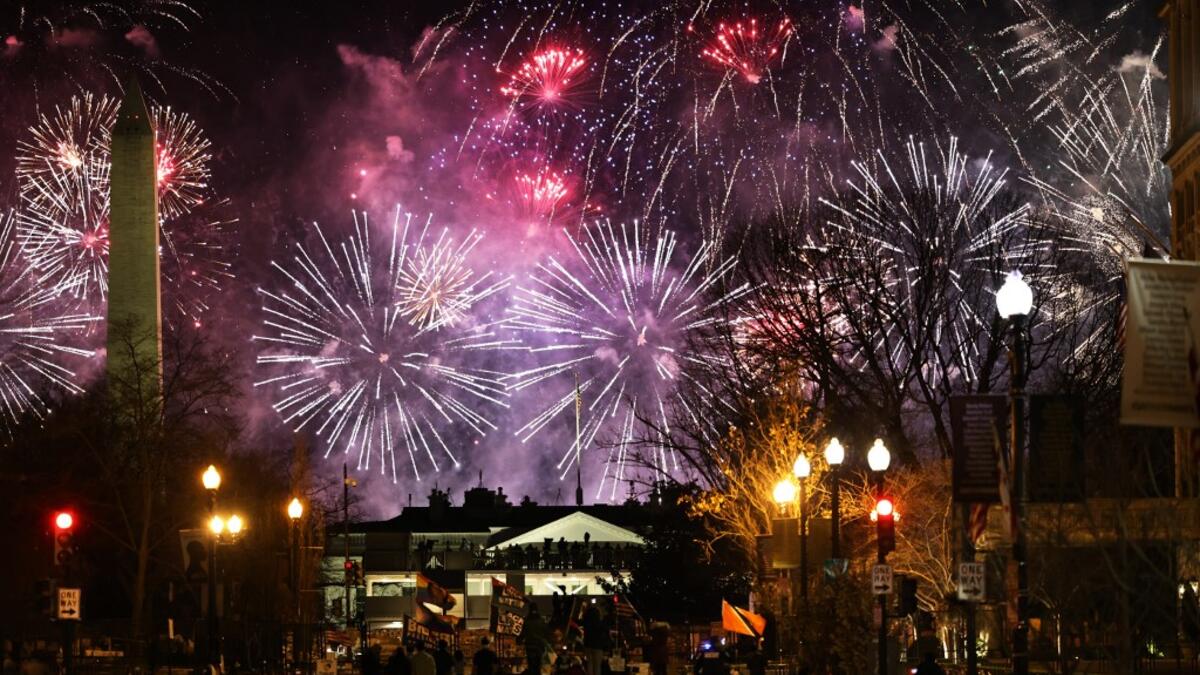Fireworks go off over the National Mall during the inauguration of President Joe Biden on January 20, 2021 in Washington, DC. Michael M. Santiago / GETTY IMAGES NORTH AMERICA / Getty Images via AFP