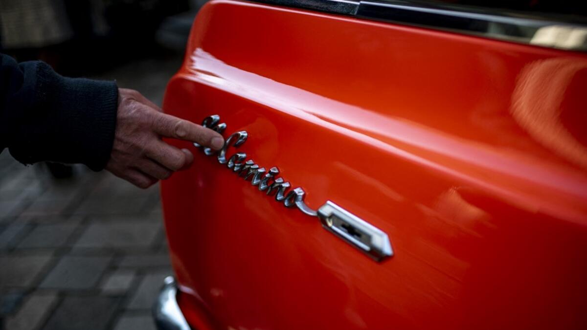 This picture taken on January 16, 2021 shows the side emblem of a 1964 El Camino Chevrolet during a gathering of auto enthusiasts in Tokyo. A loose club of fans rolls up most weekends in central Tokyo to show off their Cadillacs, Chevrolets and other modern classic vehicles from the mid to late 20th century. Philip FONG / AFP